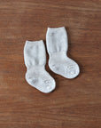 Grodo fine knit wool baby socks in sand