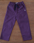Jackalo organic cotton plum pants rolled up
