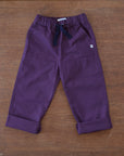 Jackalo organic cotton plum pants rolled up