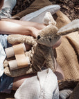 Girl holding the Large Senger organic cotton non-toxic floppy beige rabbit on her lap