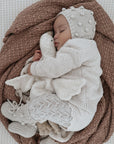 Baby sleeping with the small cuddly Senger organic cotton non-toxic goose