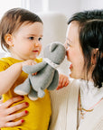 Lifestyle photo of baby in Engel wool-silk tee in saffron