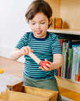 Toddler in striped turquoise and navy wool and silk Engel tee