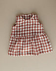 Sleeveless linen dress in terracotta gingham