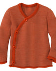 Disana wool melange side button sweater in orange-rose.