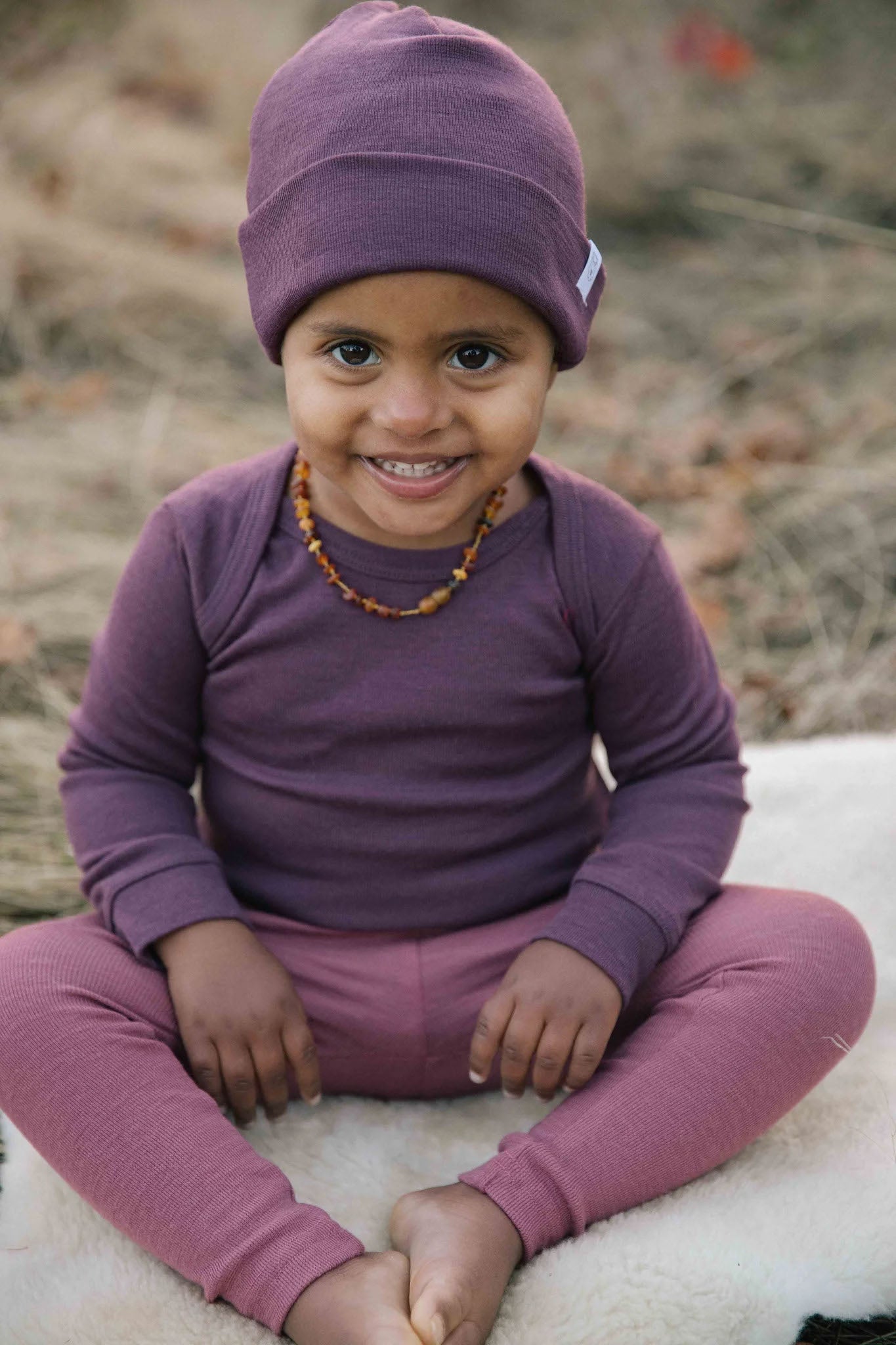 Baby in Simply Merino wool baselayers