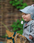 Child wearing Pickapooh organic cotton hat in baby blue
