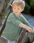 Lifestyle photo of the Disana cotton-linen sweater in jade