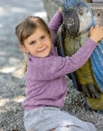 Lifestyle photo of the Disana cotton-linen sweater in lilac