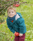 boy wearing Disana wool neck warmer