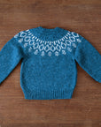 The back of the Bigelow Lane Lark Fair Isle Wool Alpaca Sweater in Blue Lagoon