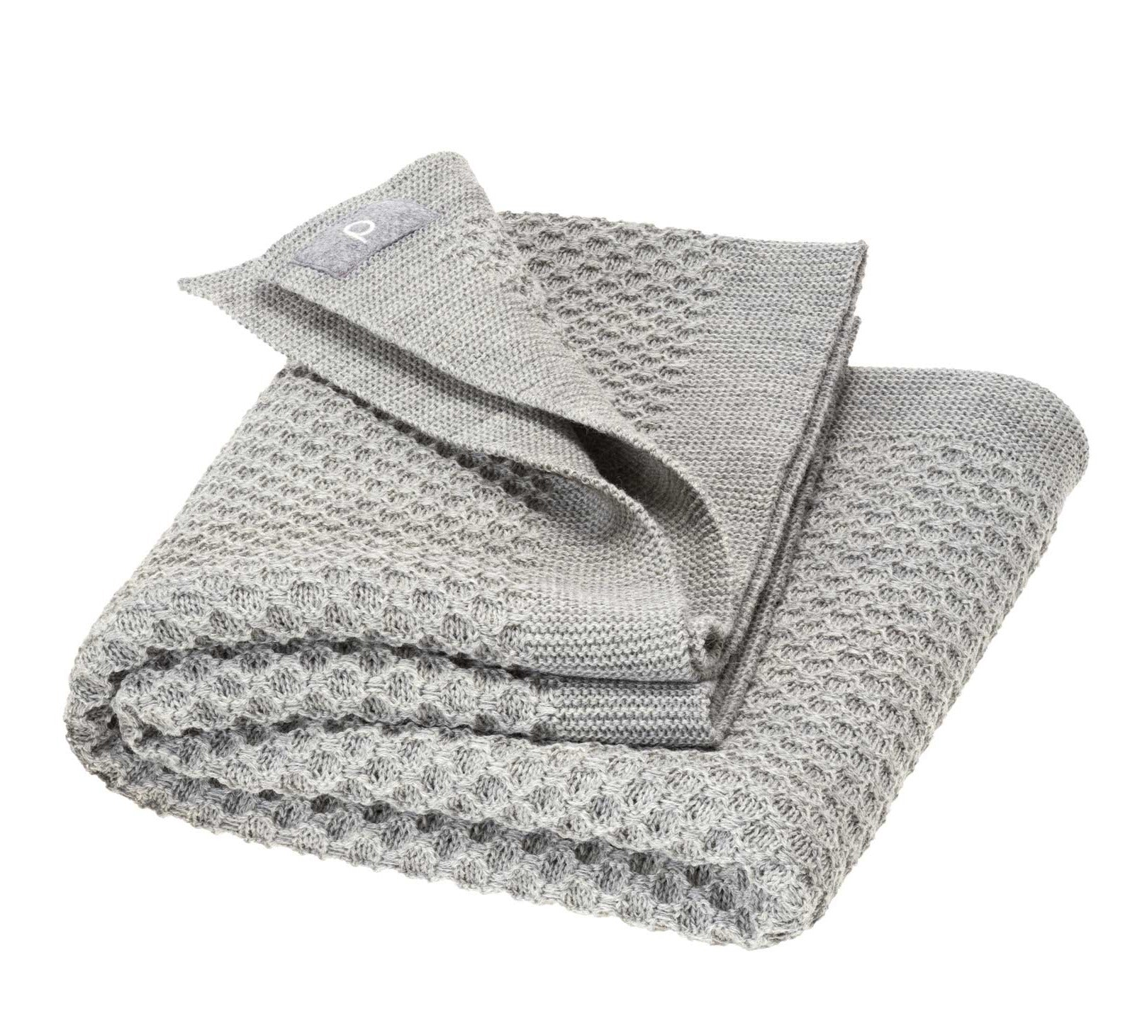 Disana&#39;s honeycomb blanket in gray. Made of 100% soft merino wool.