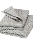 Disana's honeycomb blanket in gray. Made of 100% soft merino wool.