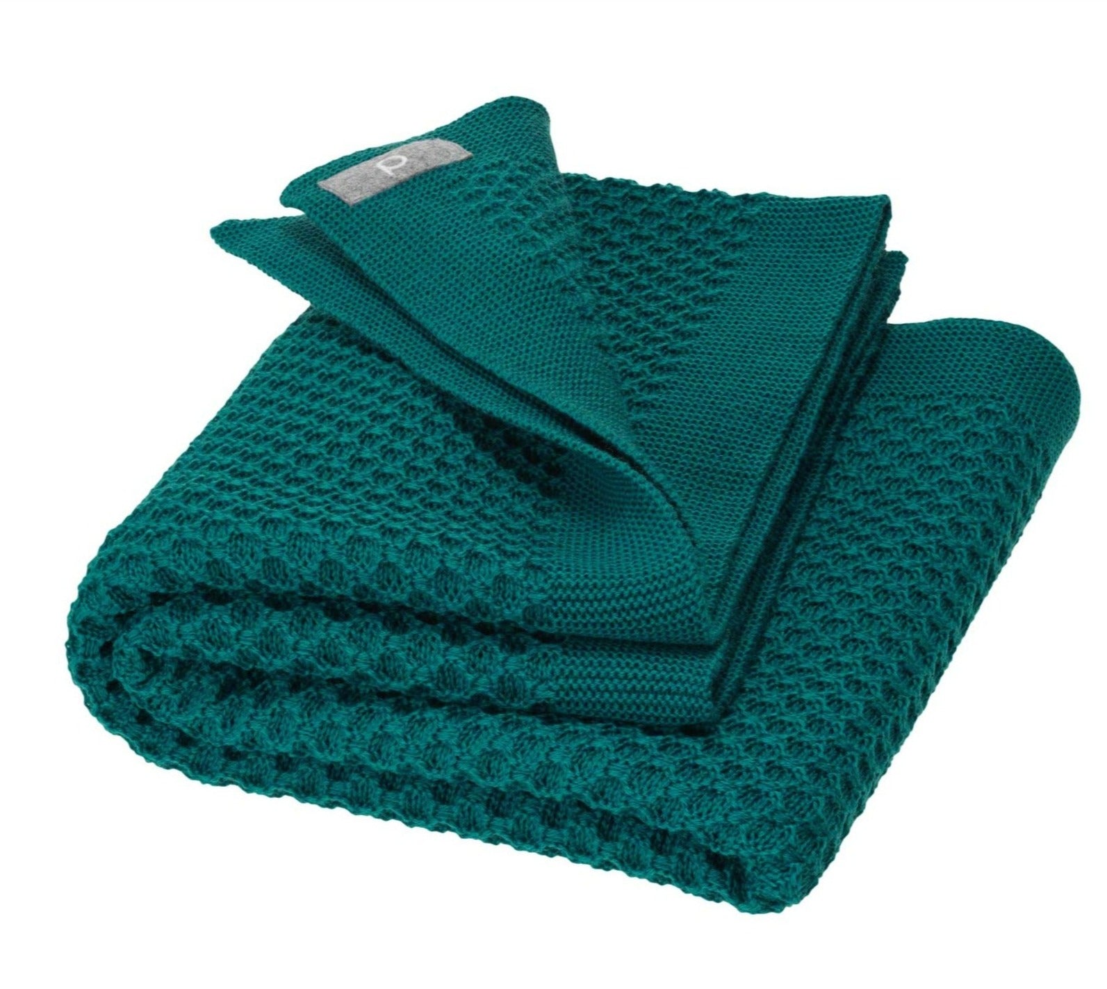 Disana&#39;s honeycomb blanket in pacific. Made of 100% soft merino wool.