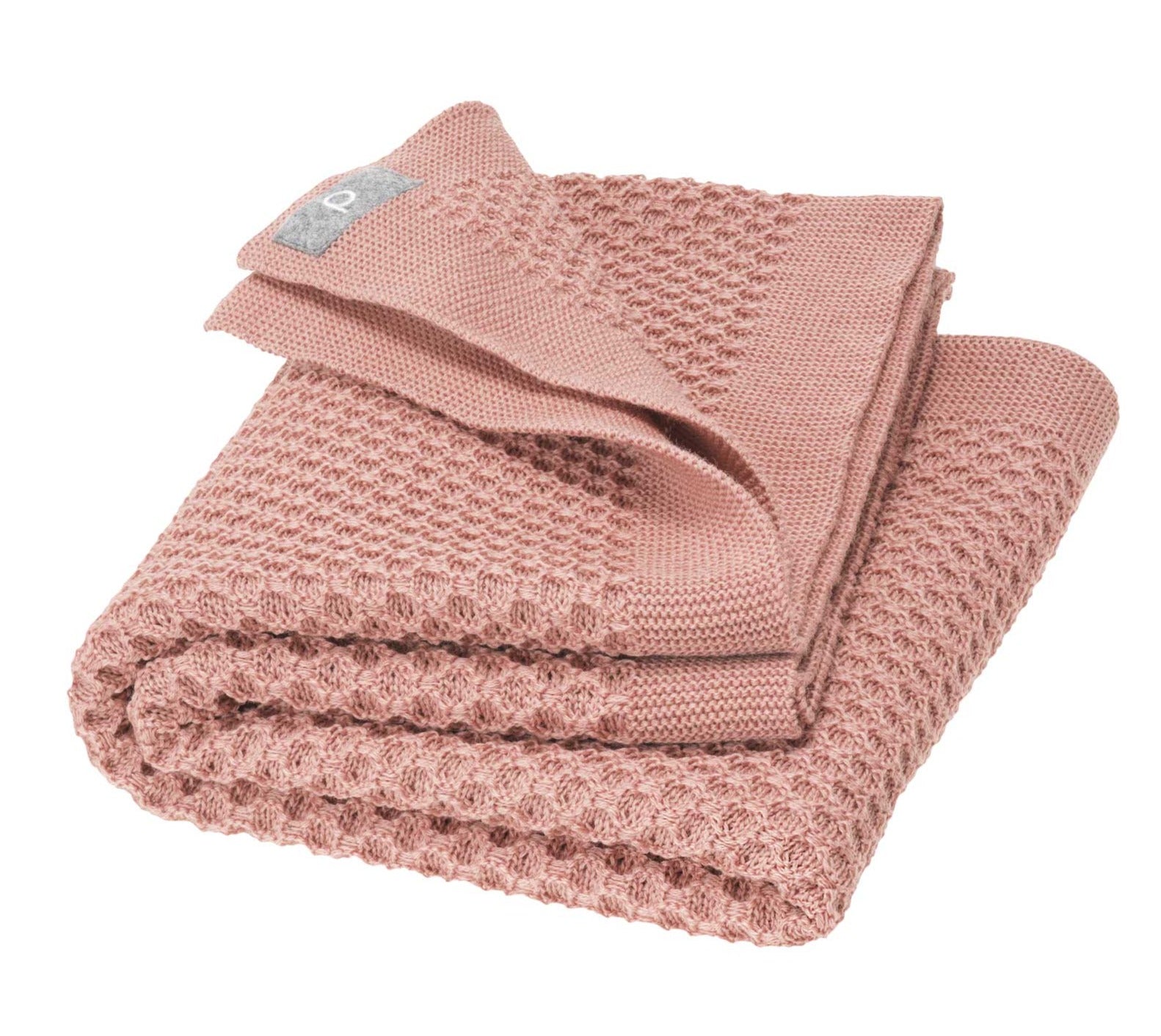 Disana&#39;s honeycomb blanket in rose. Made of 100% soft merino wool.