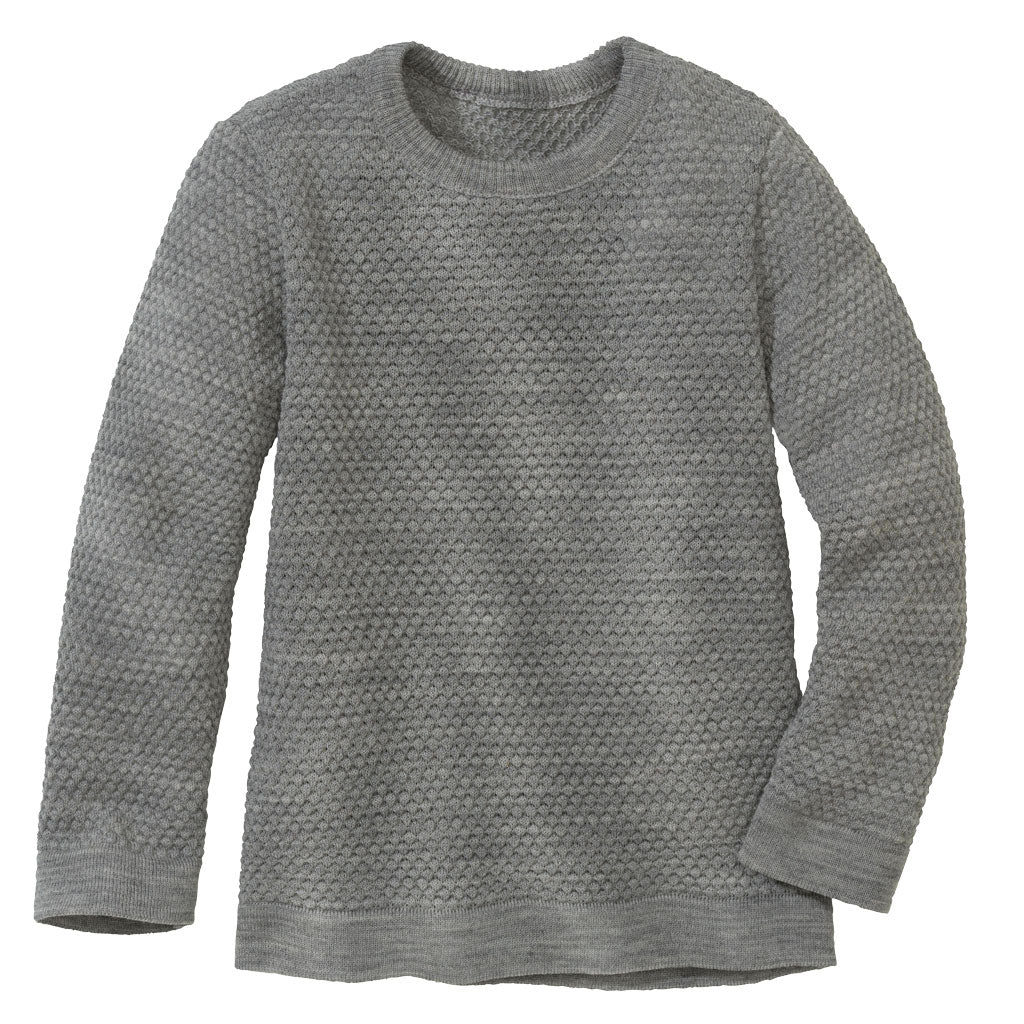 The disana honeycomb sweater in graty is made of 100% merino wool.