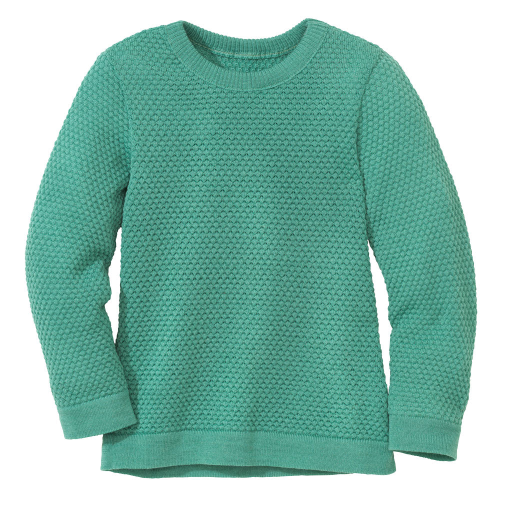 The disana honeycomb sweater in mint is made of 100% merino wool.