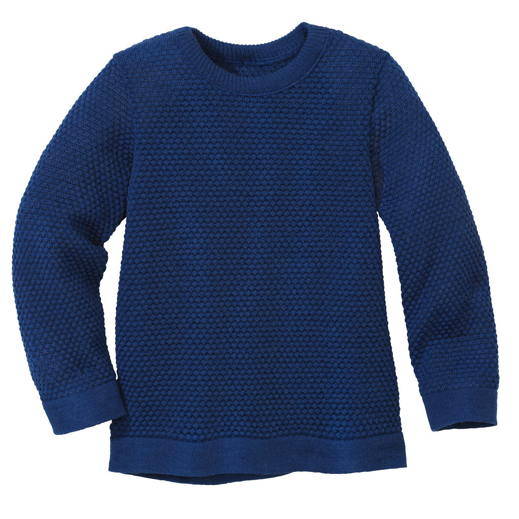 The disana honeycomb sweater in marine is made of 100% merino wool.