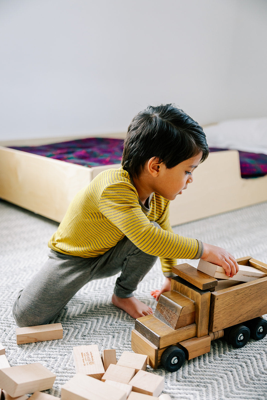 Child playing in engel wool-silk base layers