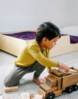 Child playing in engel wool-silk base layers