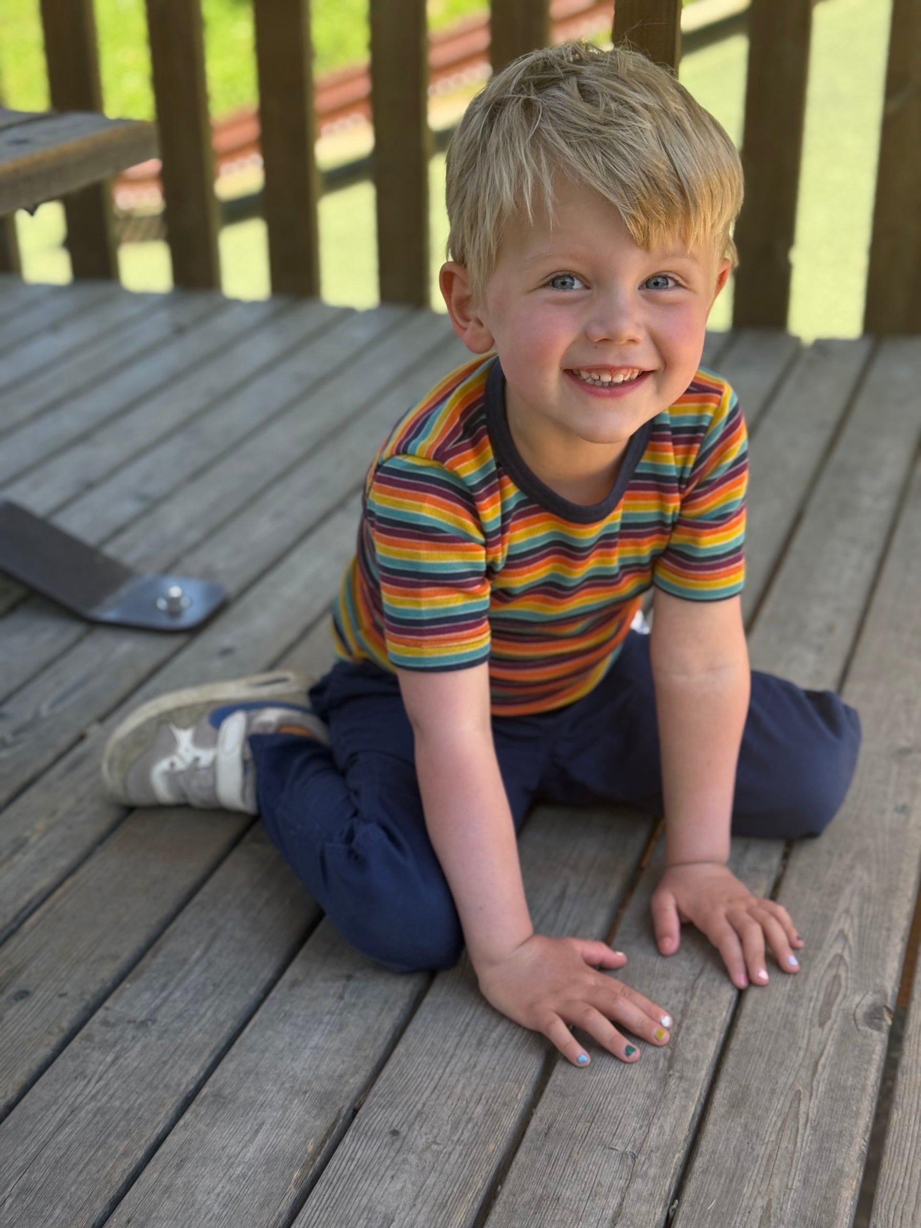 Young boy wearing the Engel retro stripe wool/silk tee