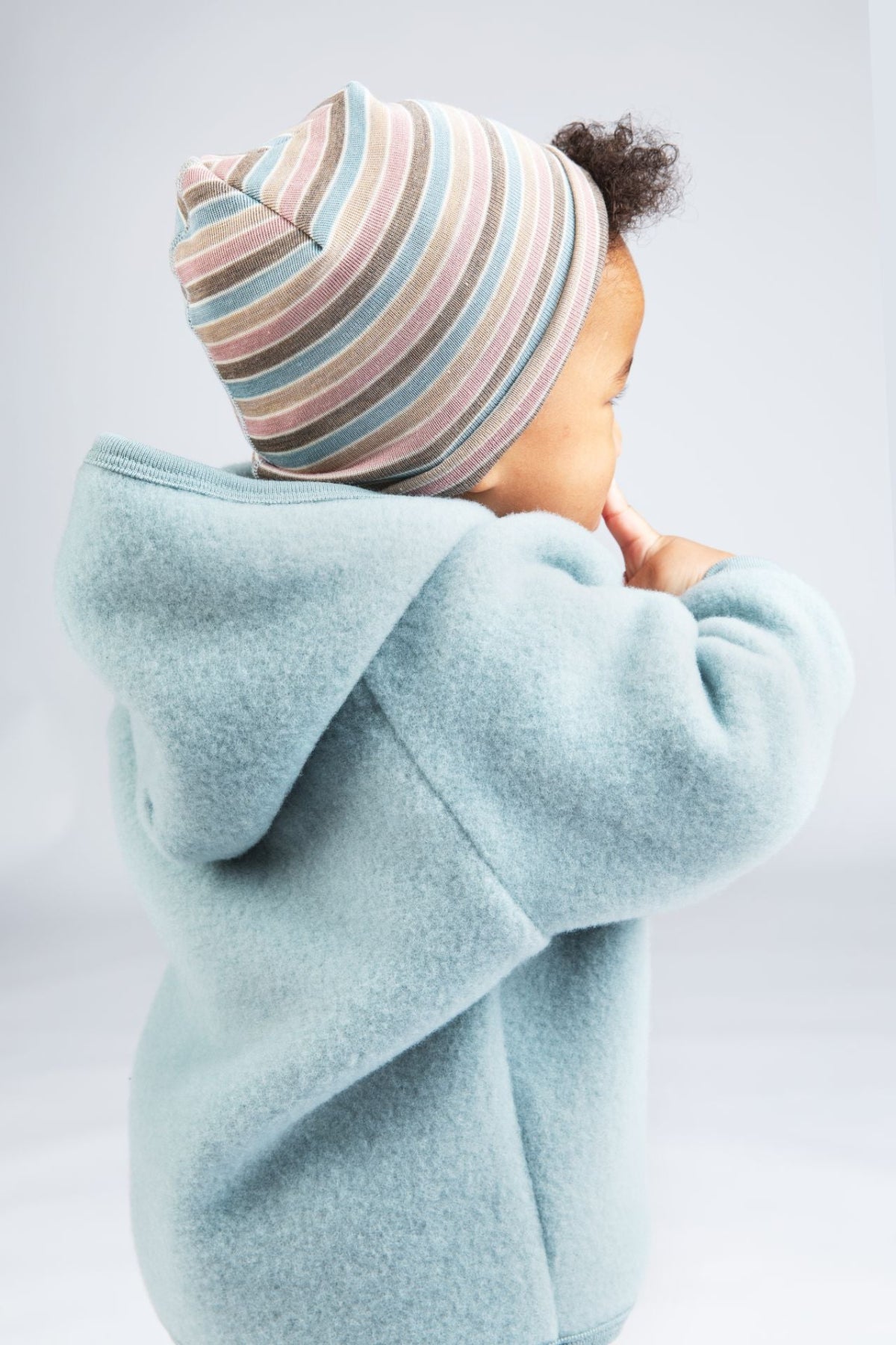 Lifestyle of Engel wool/silk beanie in pastel stripe