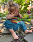 Lifestyle of Hocosa wool-silk baby pants in teal 