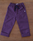 Jackalo organic cotton plum pants rolled up