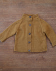 Photo of a preloved Nooks wool knit cardigan in golden spruce