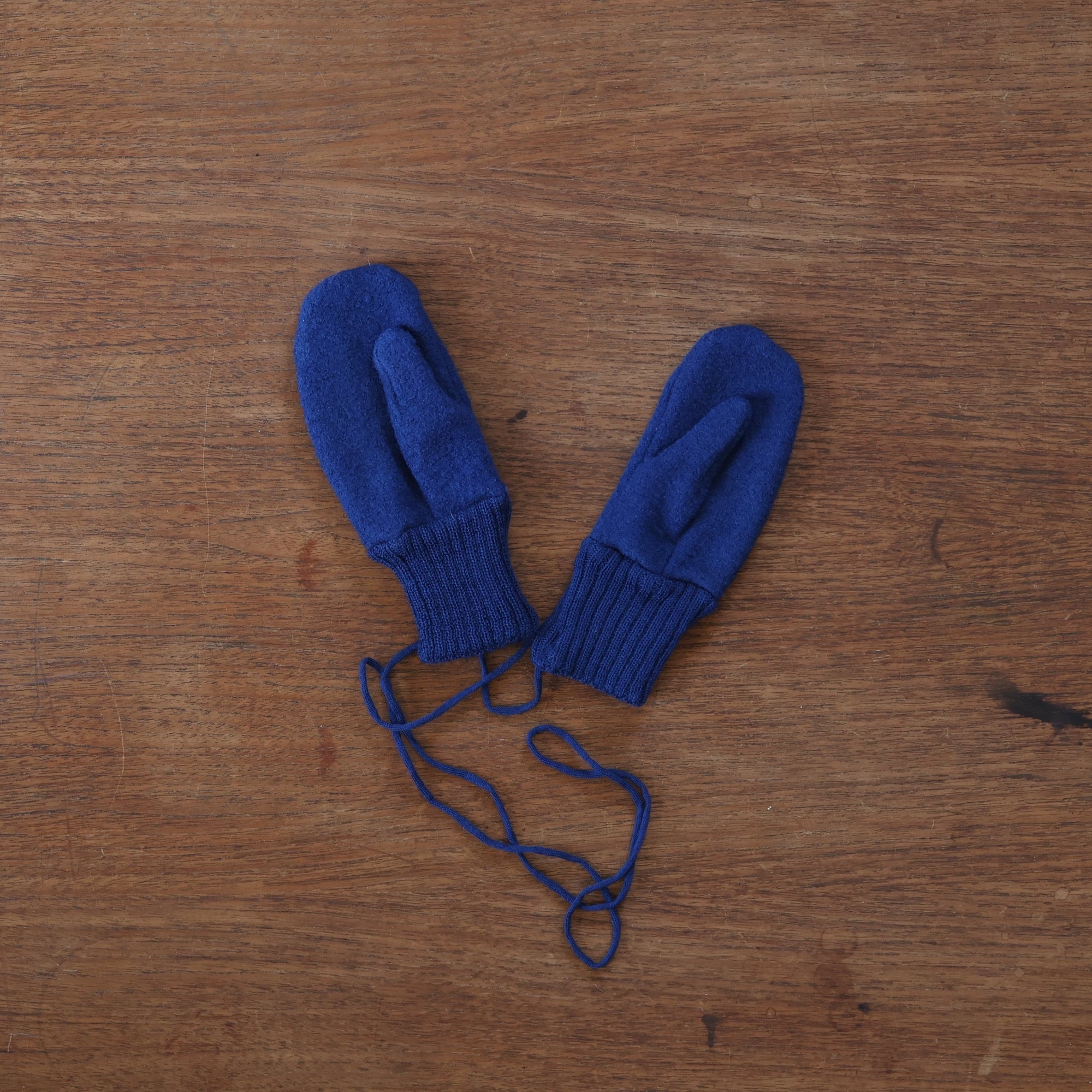Preloved disana boiled wool mittens in navy