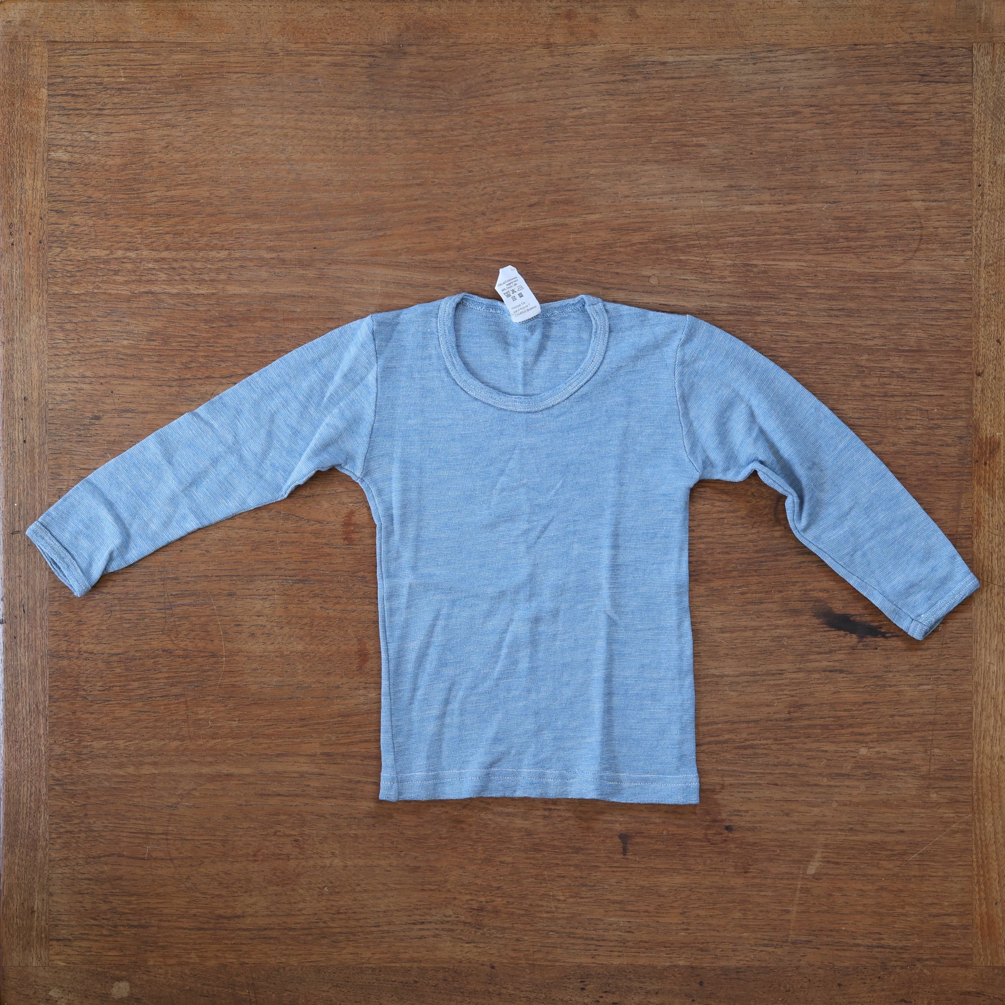Photo of preloved Hocosa wool/silk long sleeve shirt in blue heather