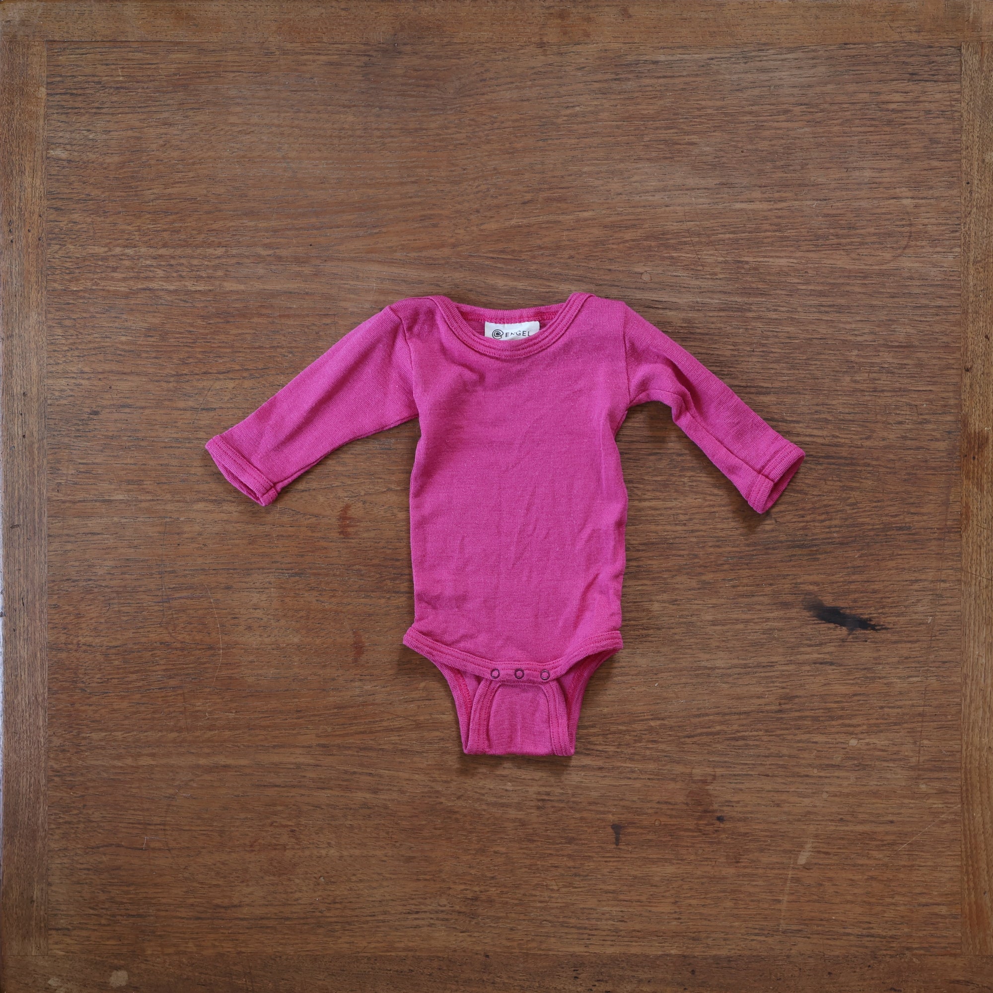 Preloved Engel wool/silk long sleeve bodysuit in raspberry