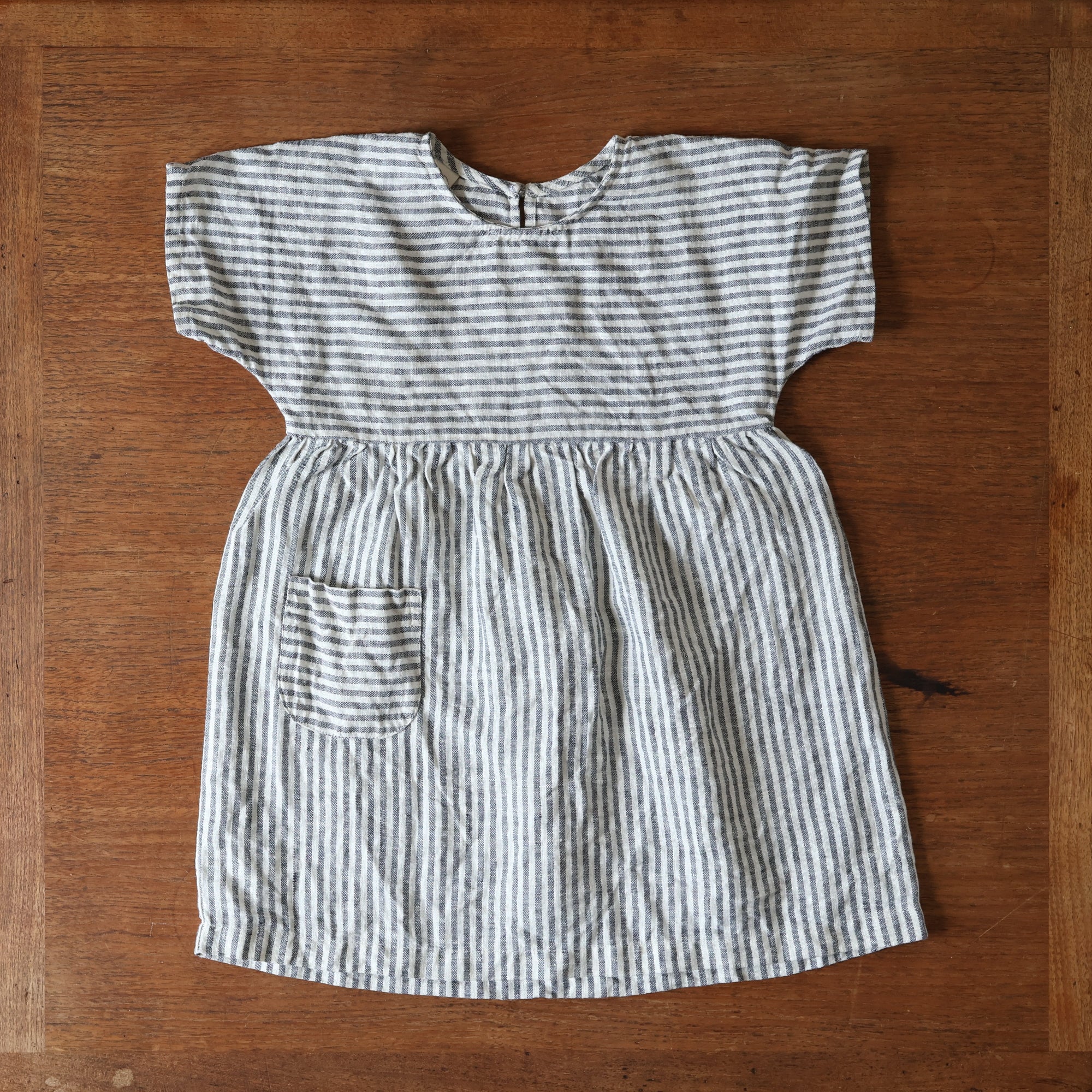 photo of preloved Bigelow Lane linen dress in gray and white stripe