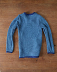 Back of preloved disansa side button sweater in navy-lagoon
