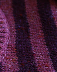 Close up of the Bigelow Lane Pip stripe Wool Alpaca Sweater in Plum peony
