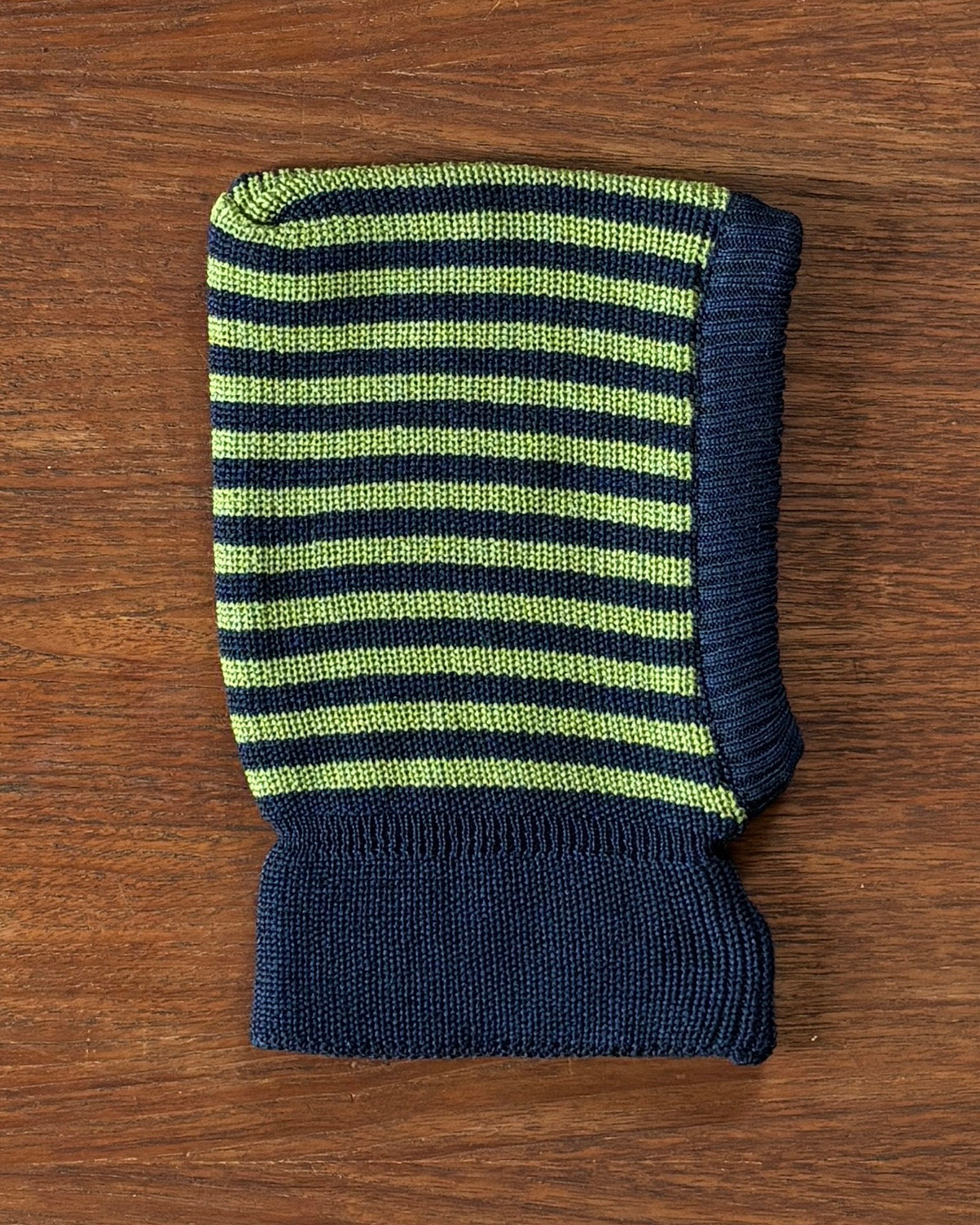 Lifestyle photo of Navy-Apple striped wool balaclava by Reiff