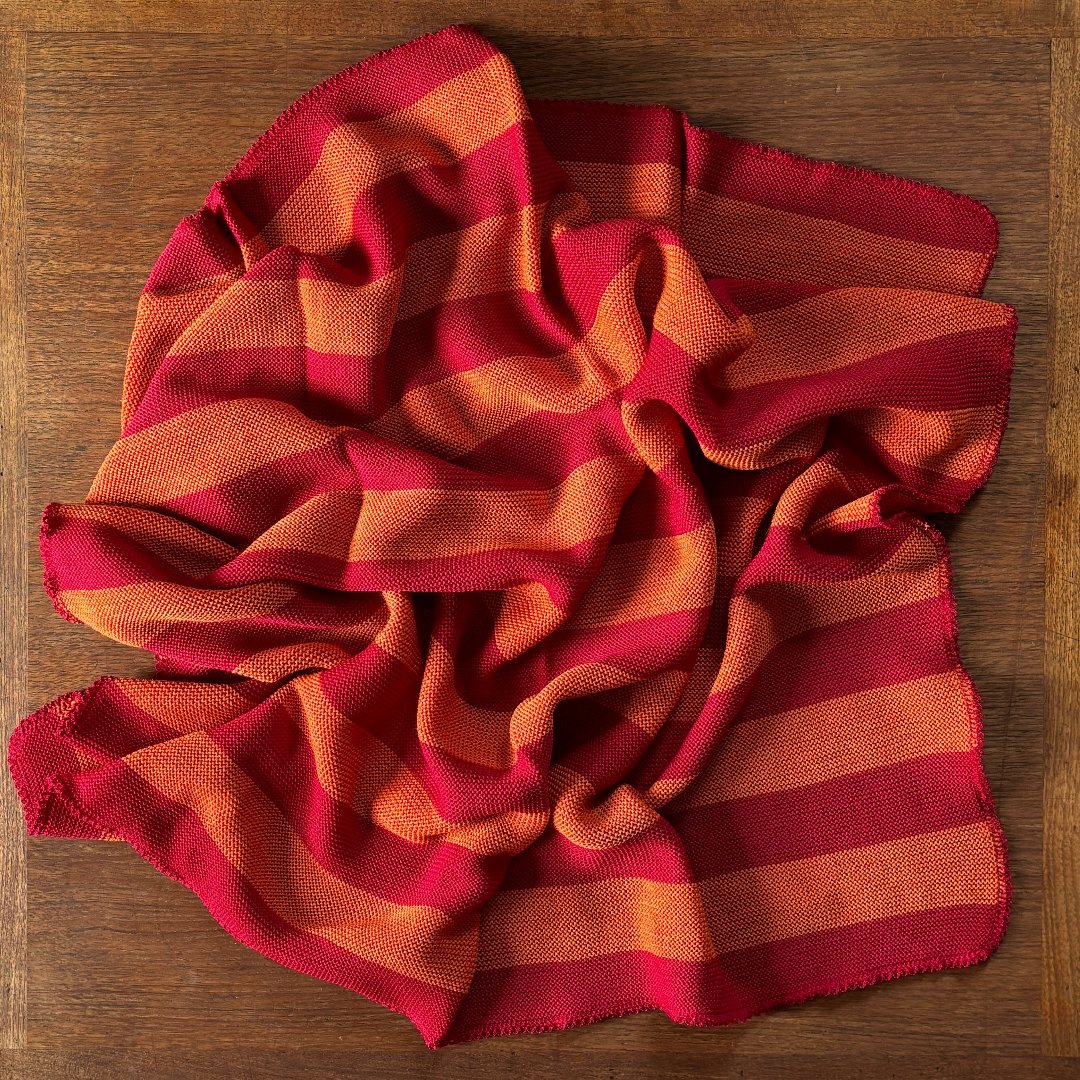 100% wool baby blanket in cayenne-orange thick stripe. Made by Reiff 