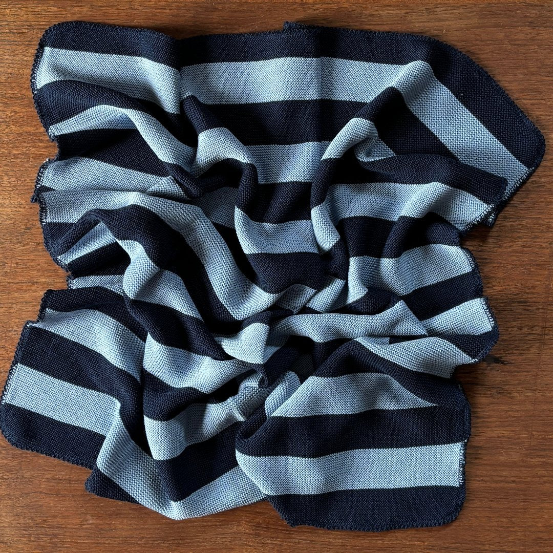 100% wool baby blanket in navy-light-blue thick stripe. Made by Reiff 