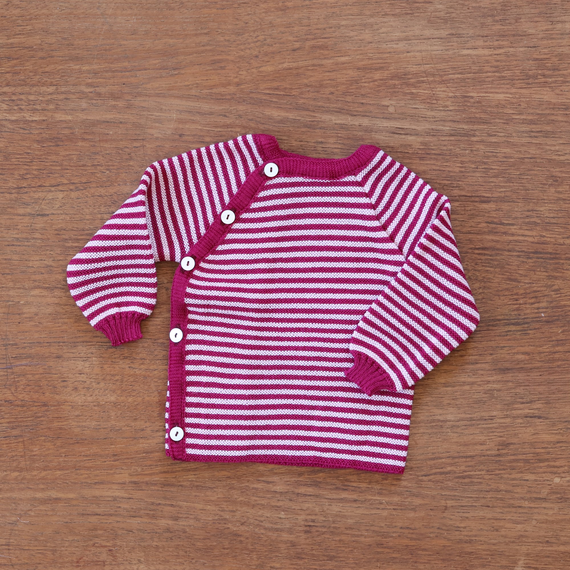 Reiff striped wool side button cardigan in berry rose stripe