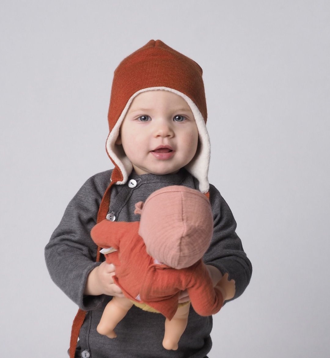 Lifestyle photo of baby in Reiff wool knit hat