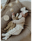 Baby sleeping with the Large Senger organic cotton non-toxic floppy beige rabbit 