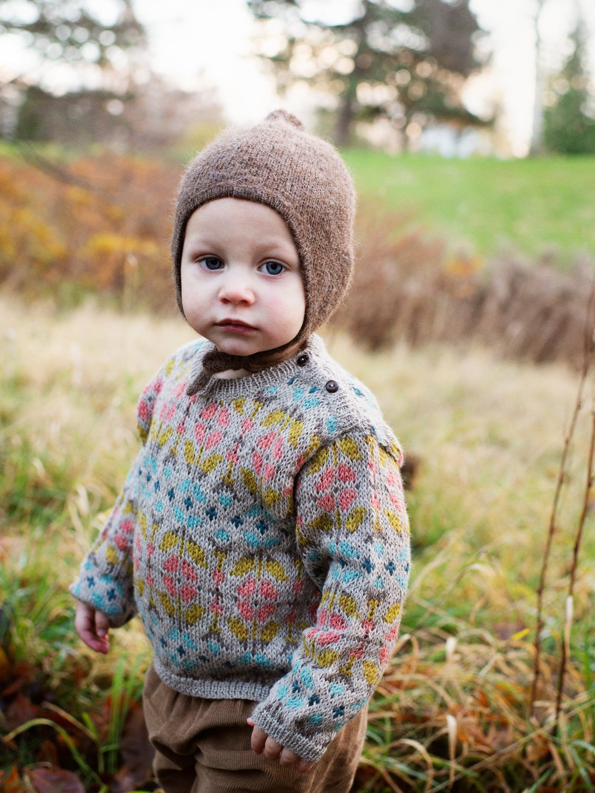 Toddler wearing serendipity alpaca garden sweater