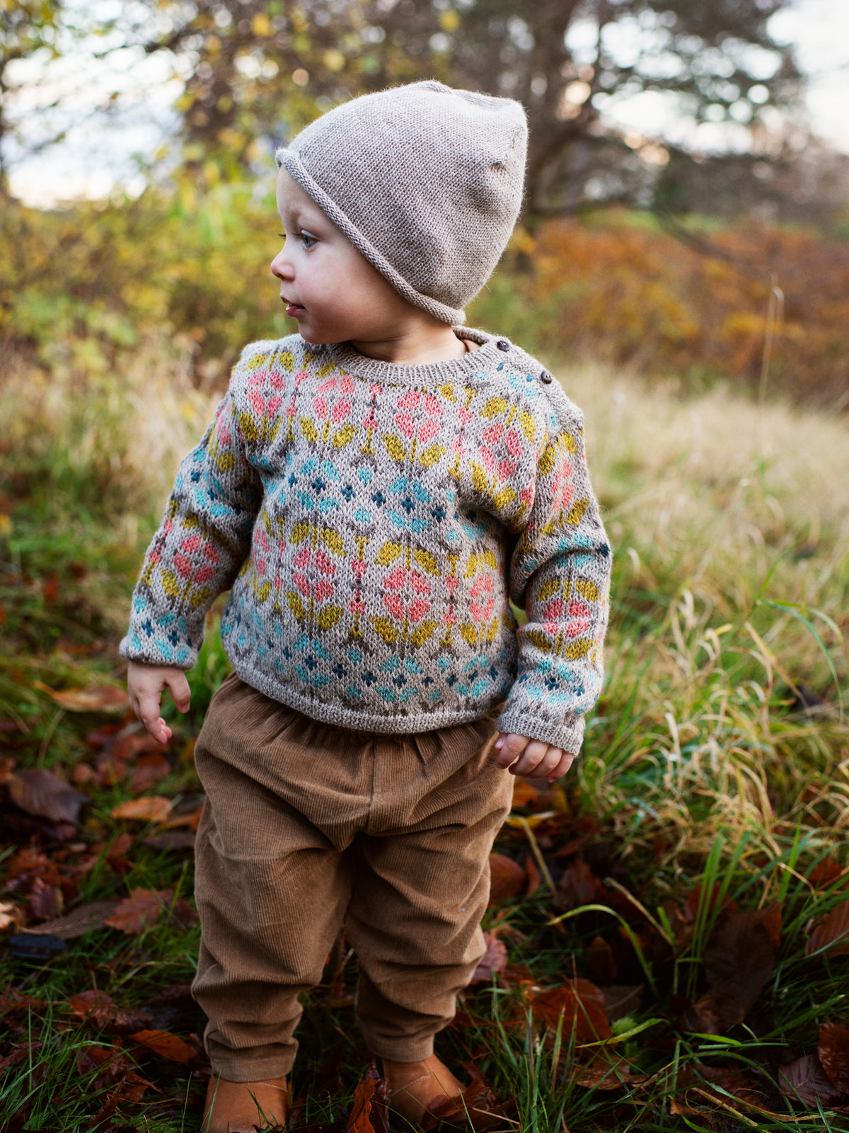 Toddler wearing serendipity alpaca garden sweater