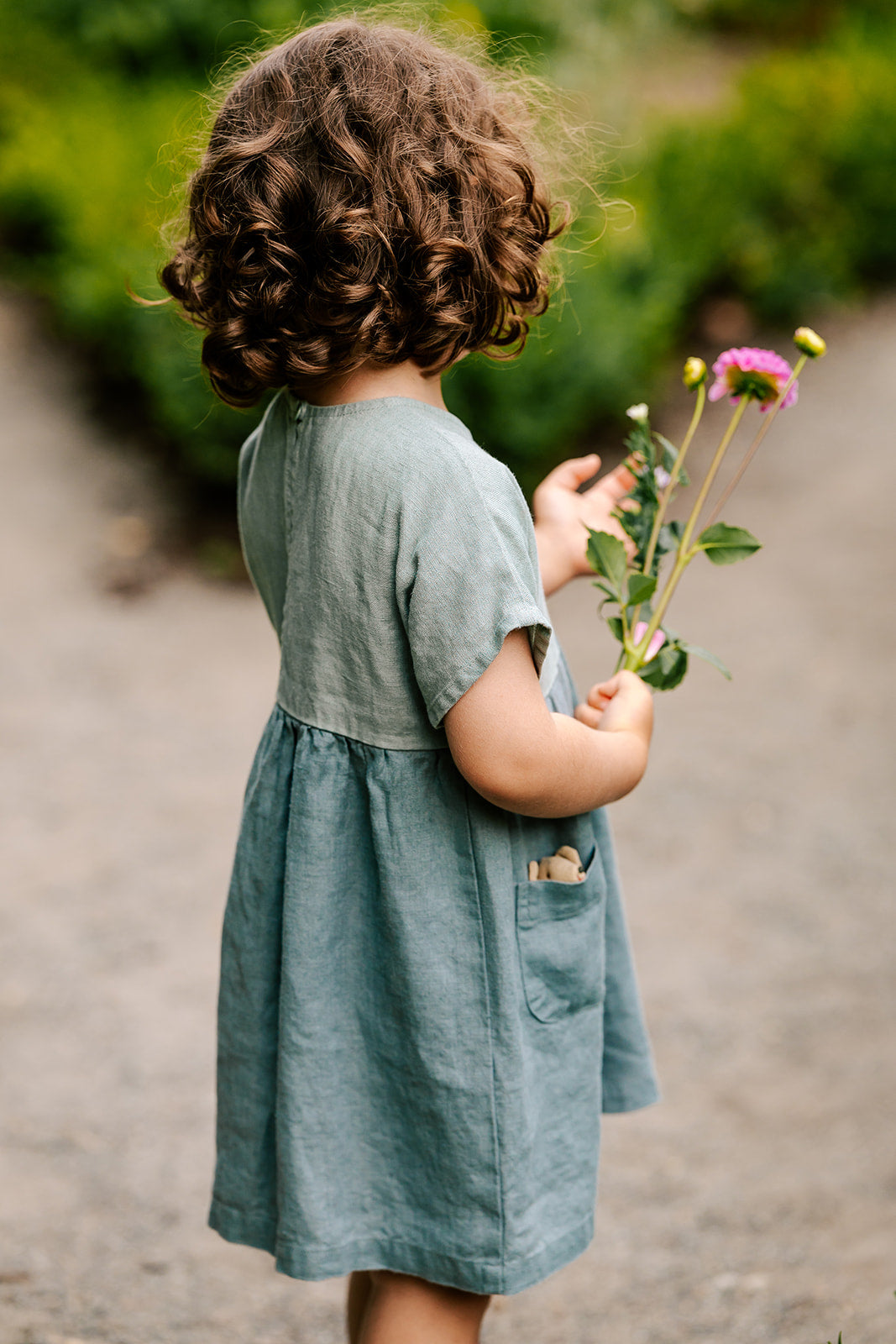 Lifestyle of linen summer dress in two tone aqua and mist