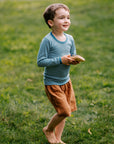 Boy in Hocosa stripe wool/silk shirt and Bigelow Lane linen shorts