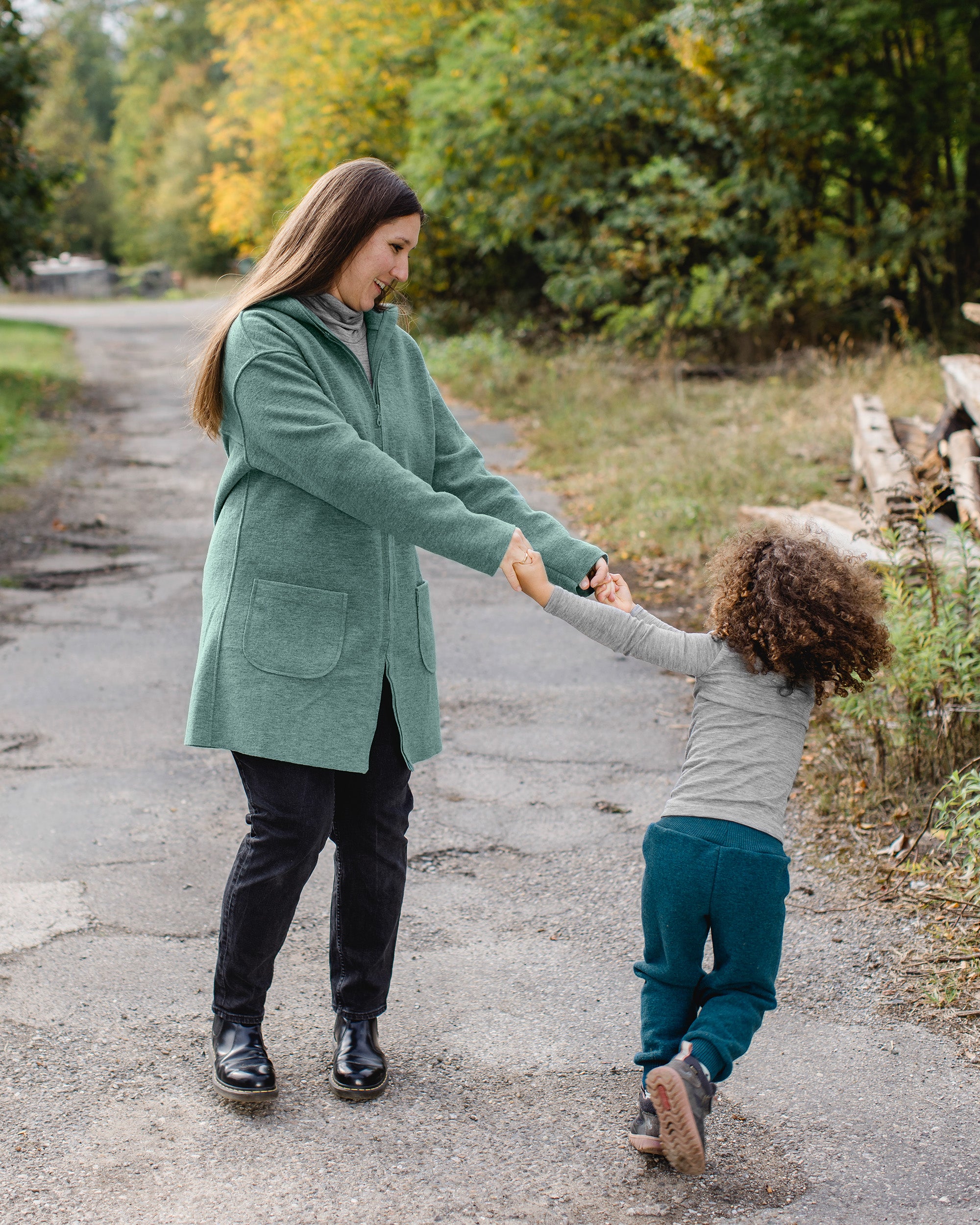 Lifestyle photo of the Engel boiled wool kids pants in Pacific