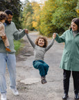 Lifestyle photo of the Engel boiled wool kids pants in Pacific