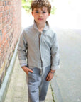 Lifestyle photo of the Jackalo mac coverall in pin stripe